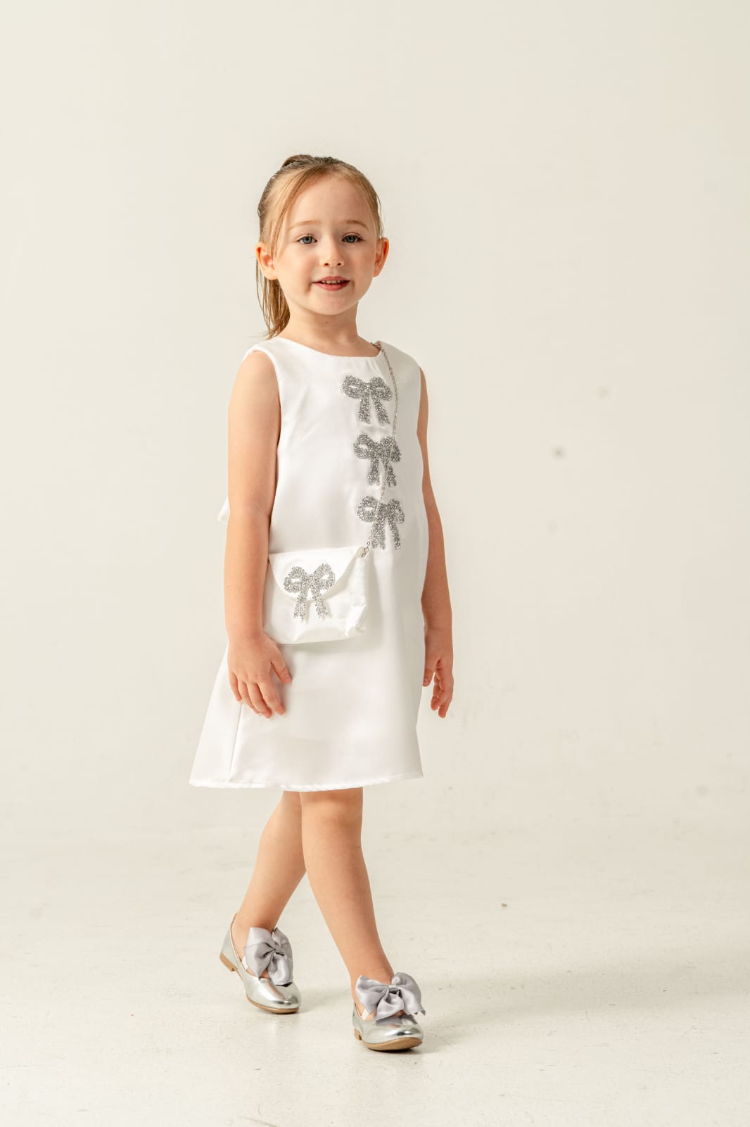 Layana White Glitter Bow Dress With Matching Purse