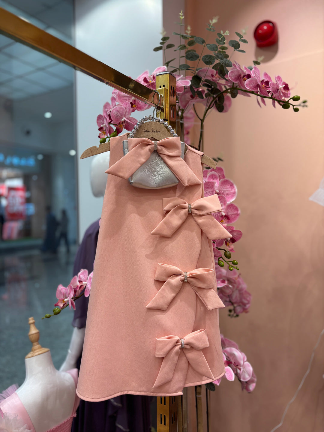 Celestine Girls Elegant Peach A-Line Dress with Triple Side Bow