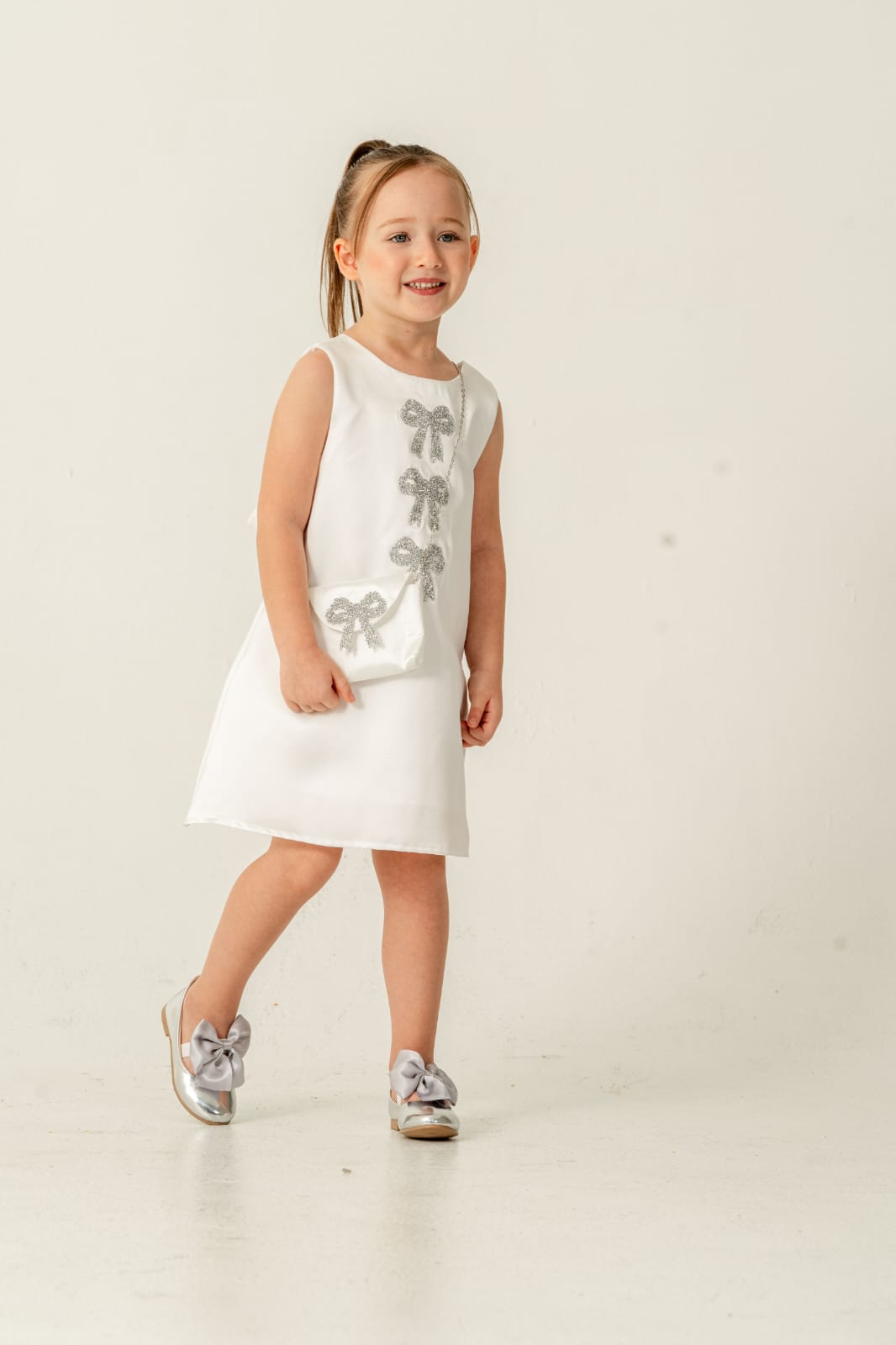 Layana White Glitter Bow Dress With Matching Purse